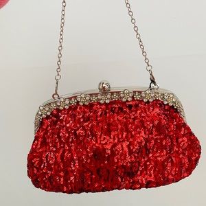 Glittery red party clutch